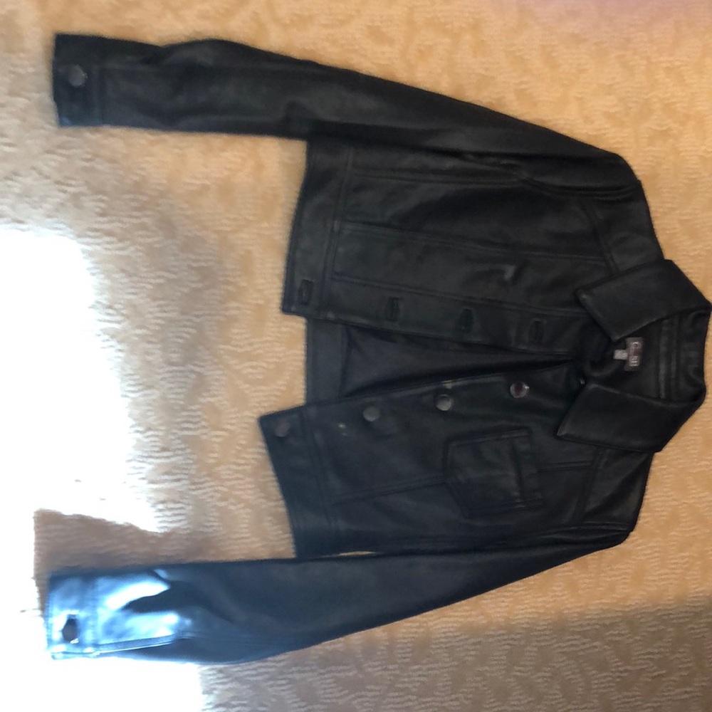 Woman’s black short waisted leather jacket